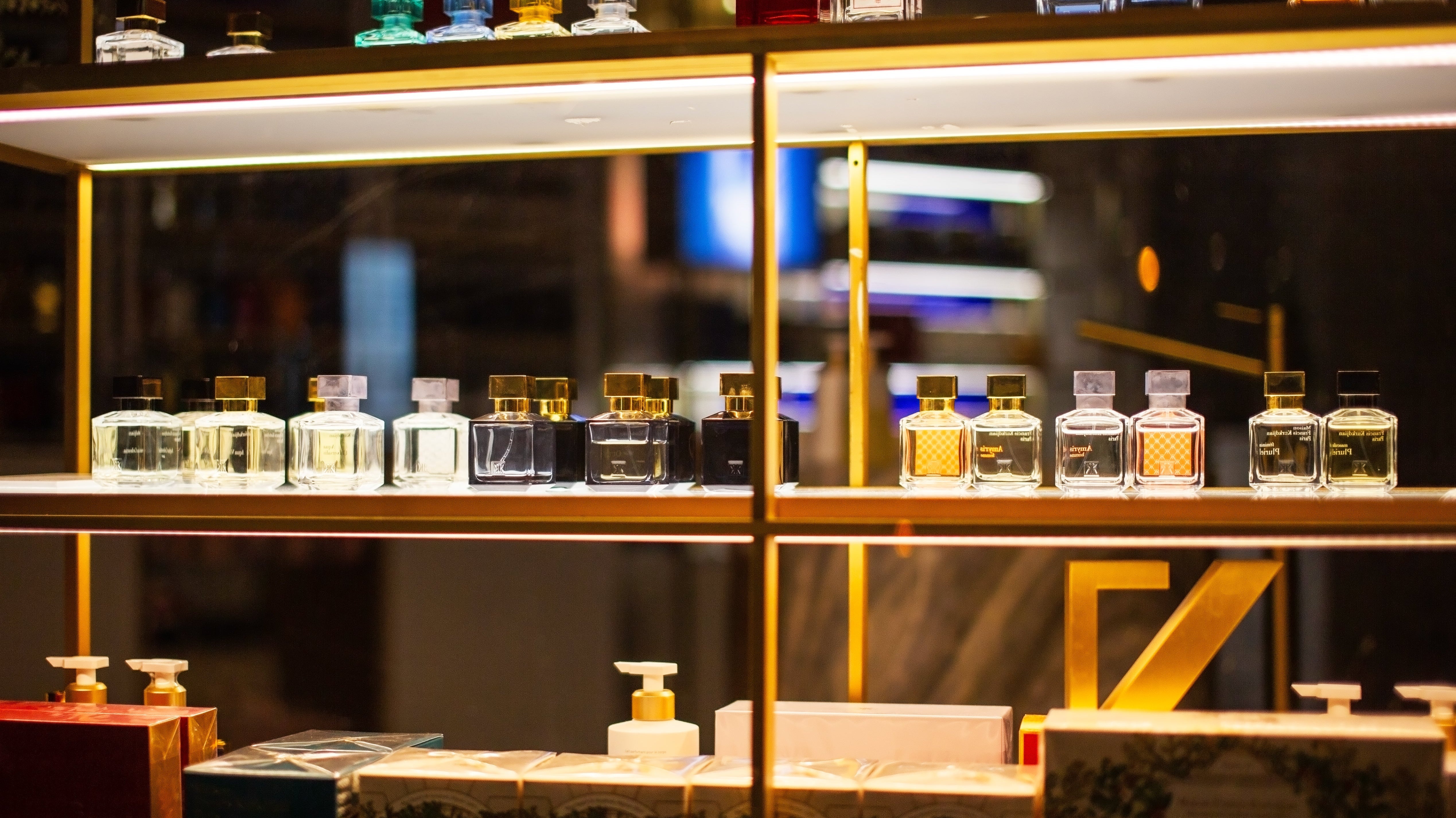 Perfumes on display at a store.