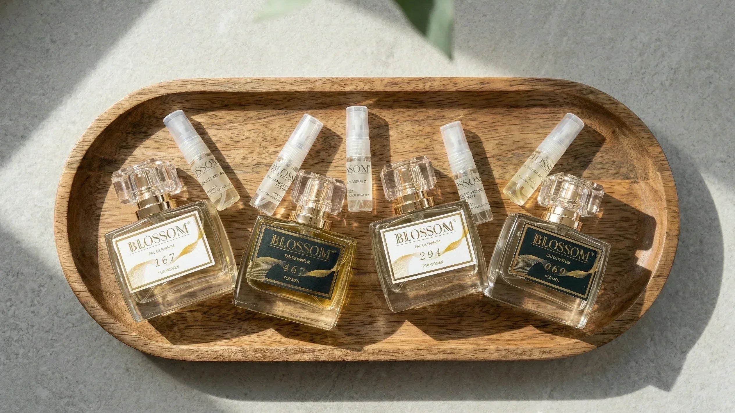A selection of Blossom Perfumery’s perfume bottles and sample bottles, showcasing variety.