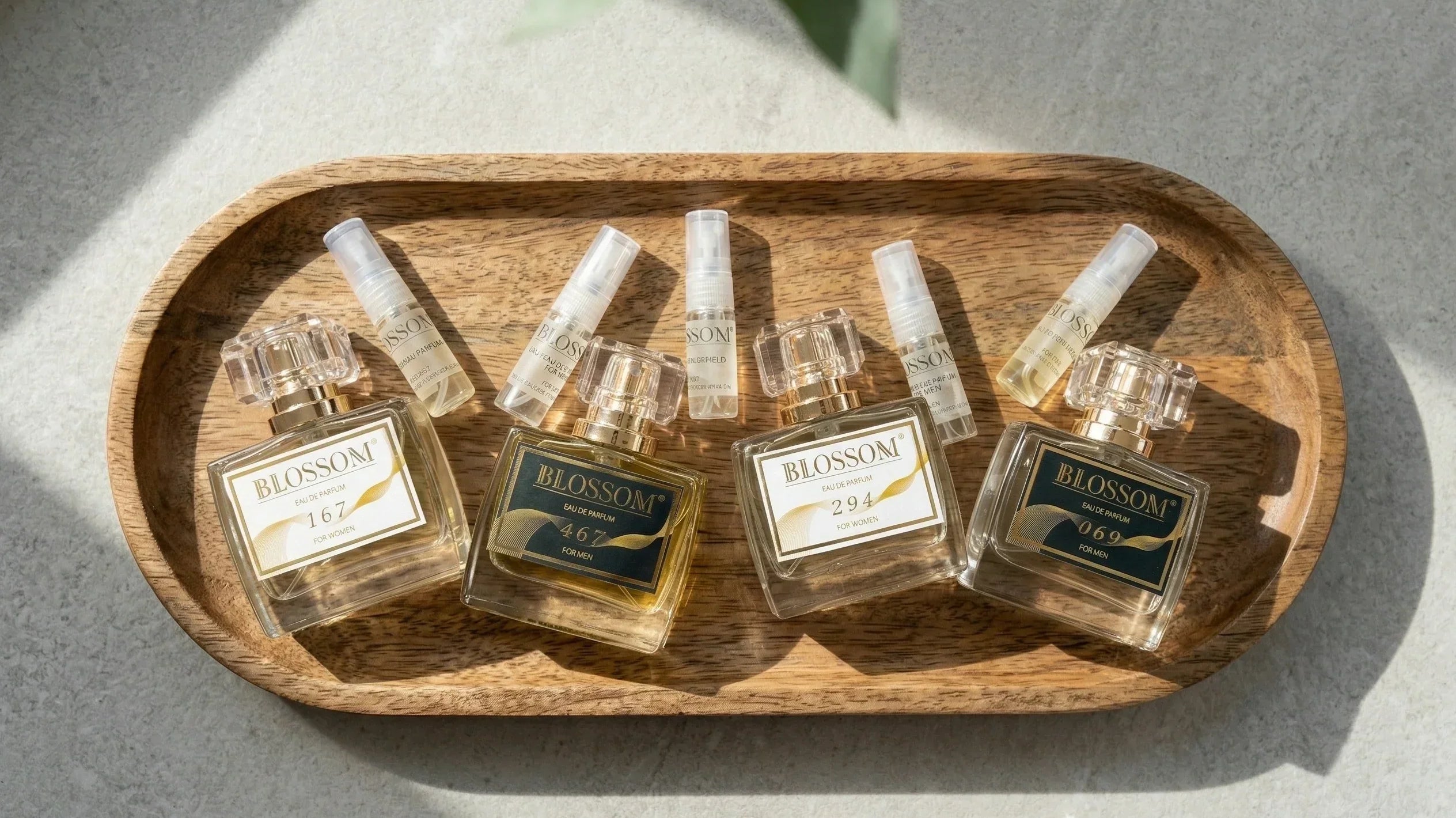 A selection of Blossom Perfumery’s perfume bottles and sample bottles, showcasing variety.