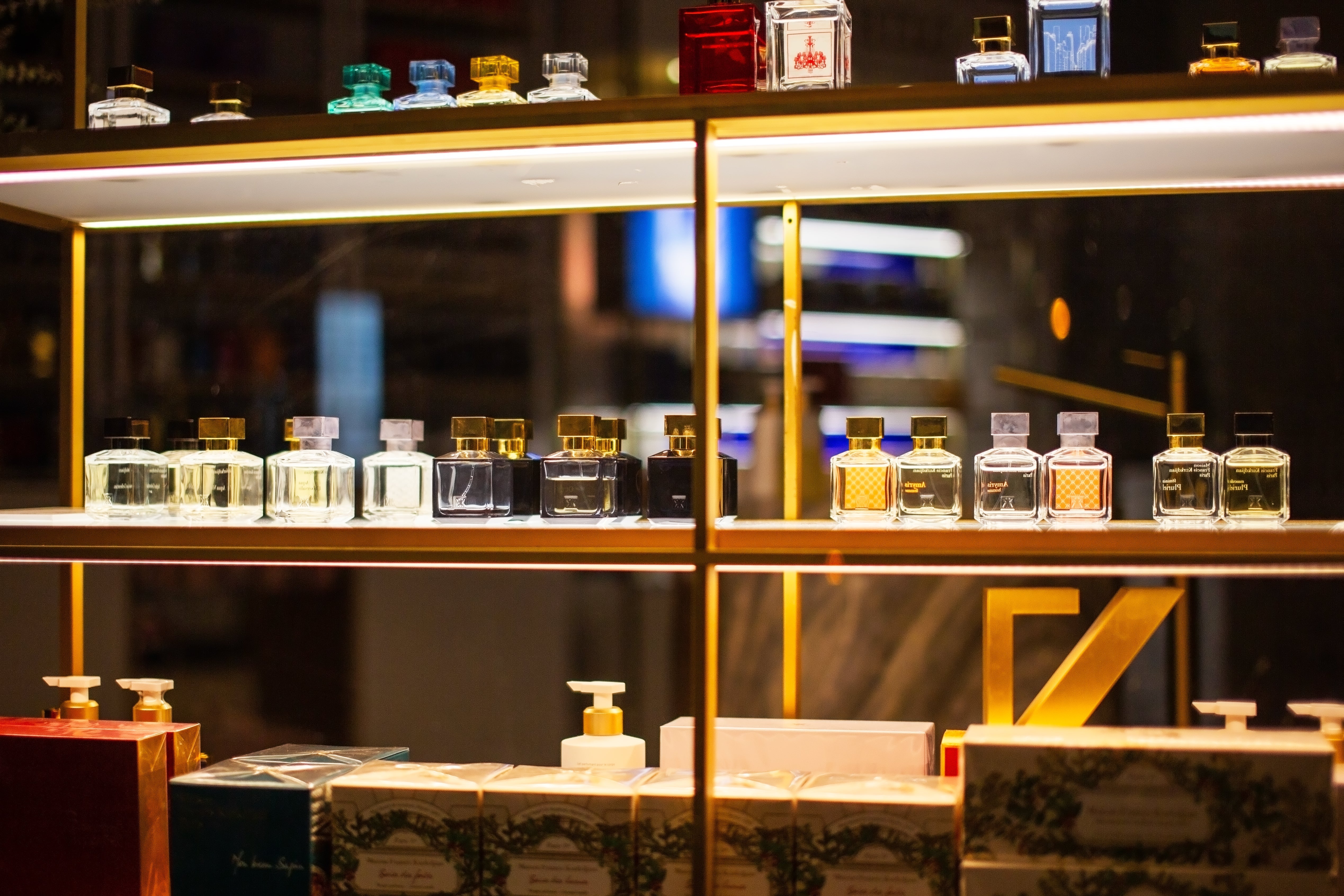 Perfumes on display at a store.