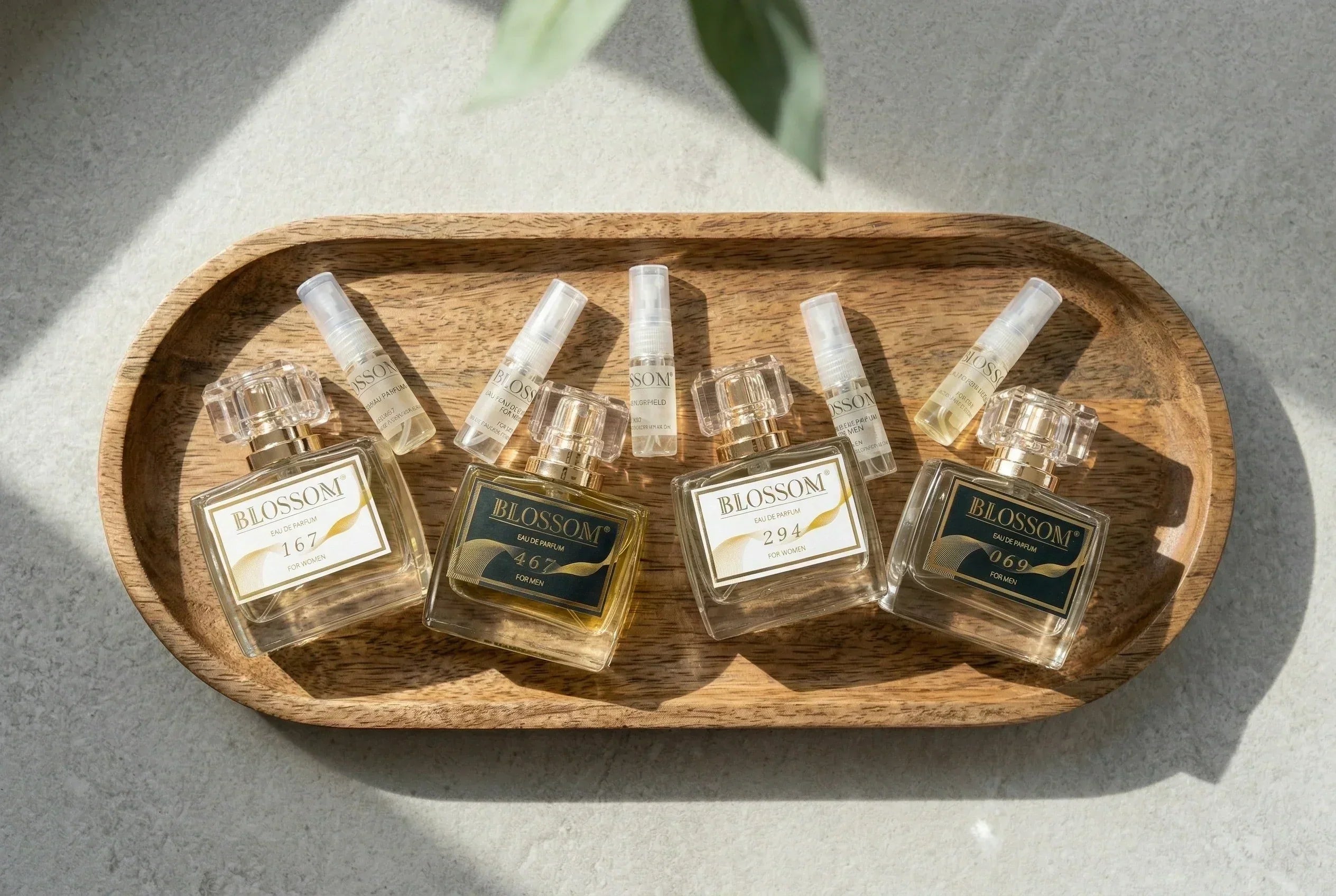 A selection of Blossom Perfumery’s perfume bottles and sample bottles, showcasing variety. 