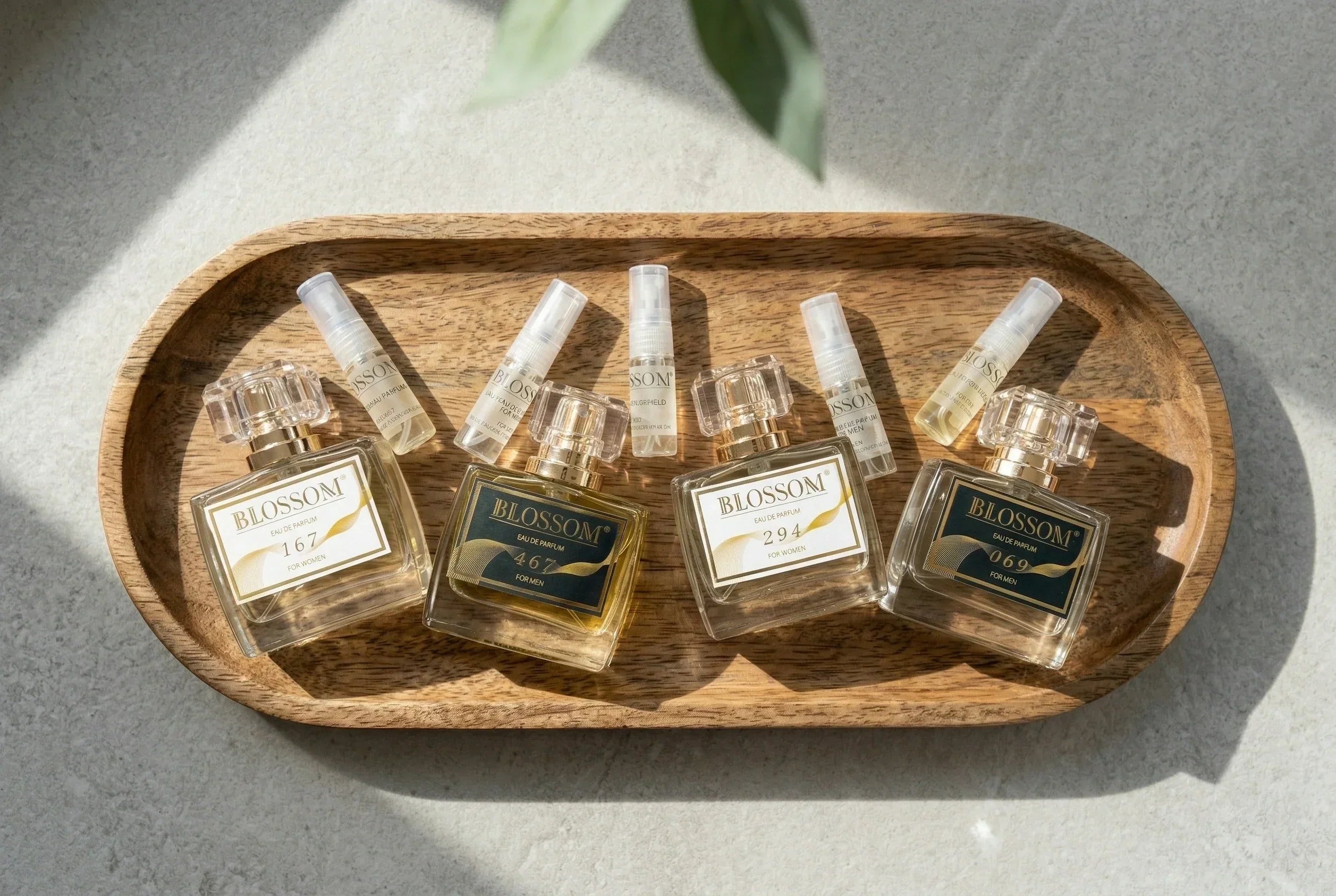 A selection of Blossom Perfumery’s perfume bottles and sample bottles, showcasing variety. 
